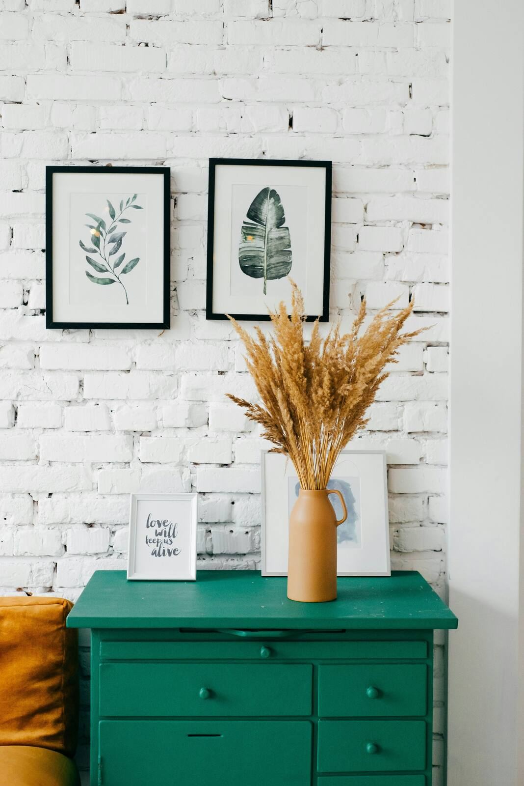 One natural element with real texture often does more than a shelf of accessories.
